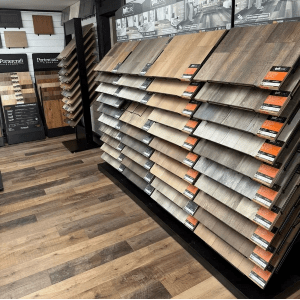 Inside the Best Floors & More showroom — racks of flooring samples